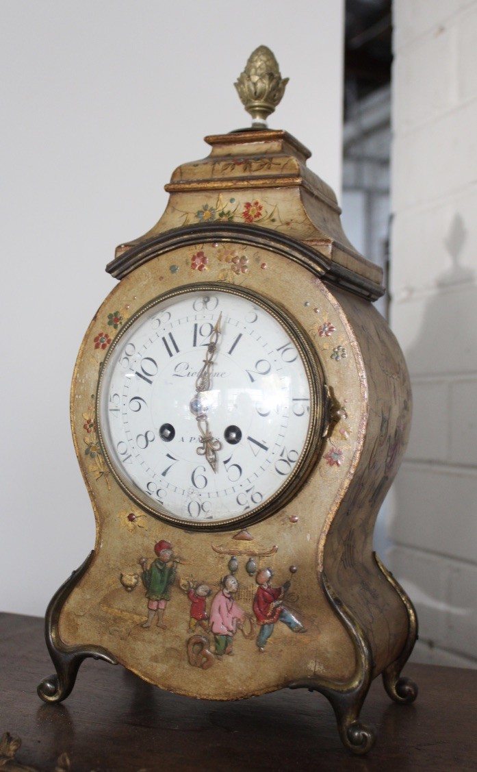 French Louis XVth chinnoissie decorated mantle clock, having enamel dial. Price $950