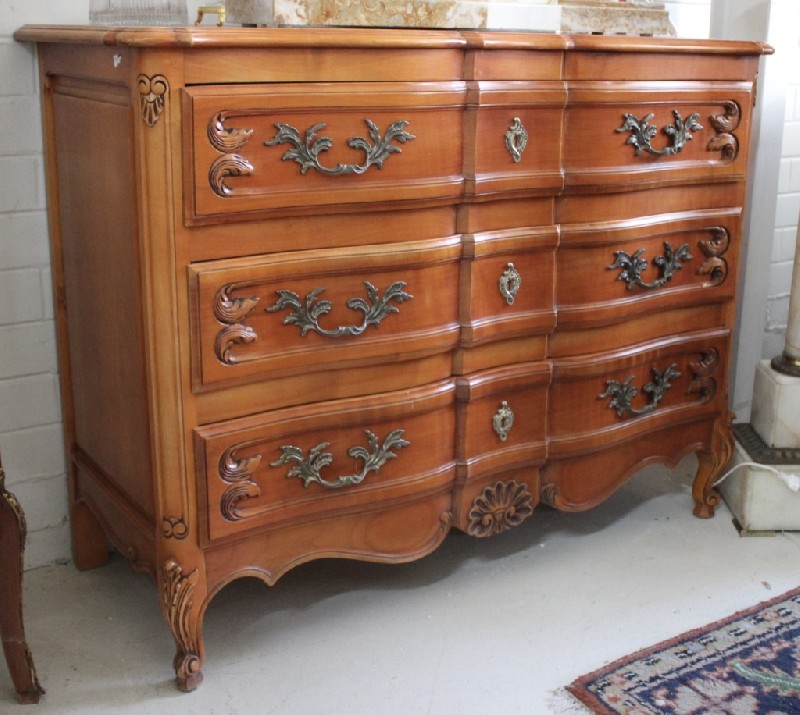 French provincial cherry wood 3 drawer commode, with bronze handles. Price $880