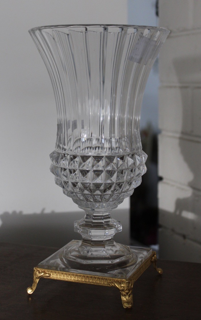 Cut crystal flared vase with brass brass. Price $220