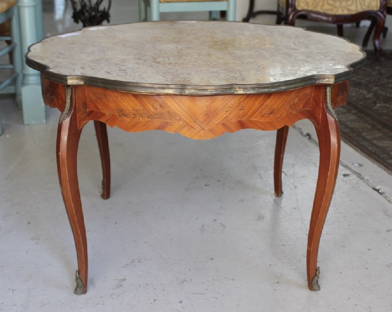 French early 20th centruy Louis XVth walnut and marble top coffee table, having bronze mounts. Price $880