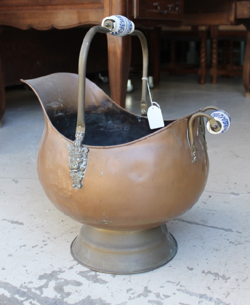 Antique French copper fuel bucket with b/w porcelian handles. Price $150