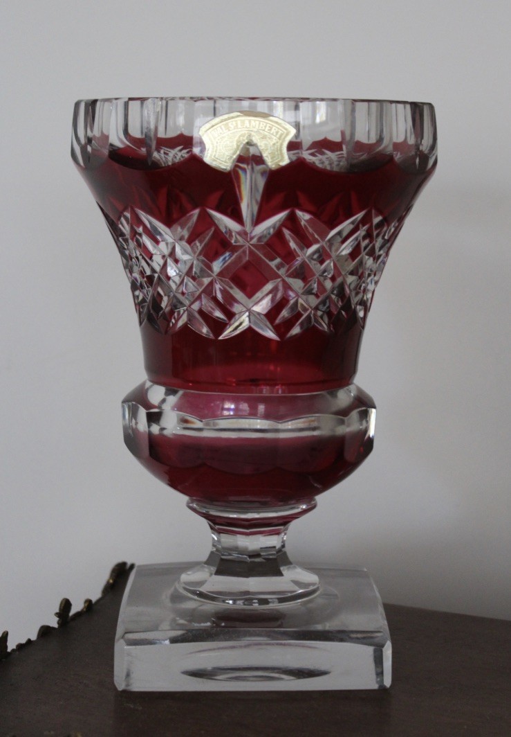 Val Sint Lambert ruby and clear cut crystal flared vase on sqaure base. Price  $680