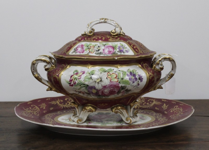 Paris porcelain magenta and floral decorated lidded terrine on stand with gilt highlights. Price $625
