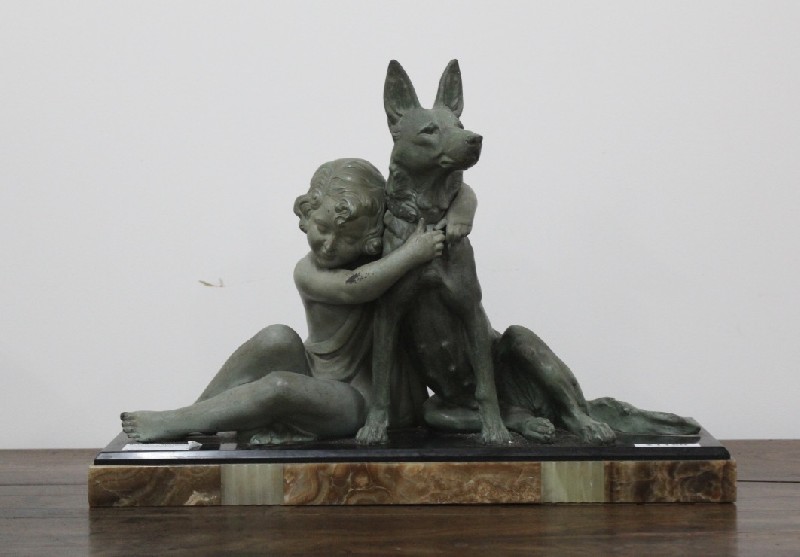 French art deco spelter statue of a seated child hugging a dog on marble base. Price $1100
