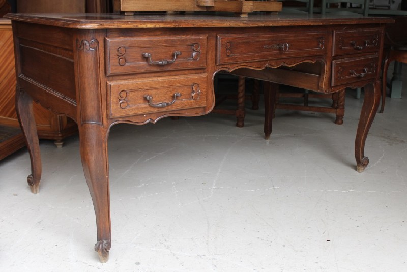 French provincil oak 5 drawer bureau, having iron drop handles. Price $1500