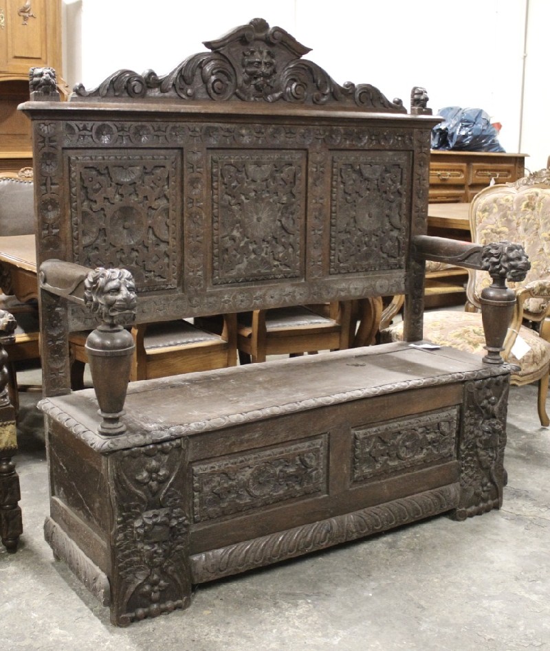 19th century French carved oak hall way bench settle, having cupids and dragon decoration. Price $1750