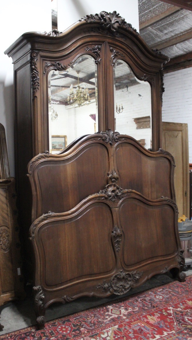 19th century French Louis XVth walnut bedroom suite.