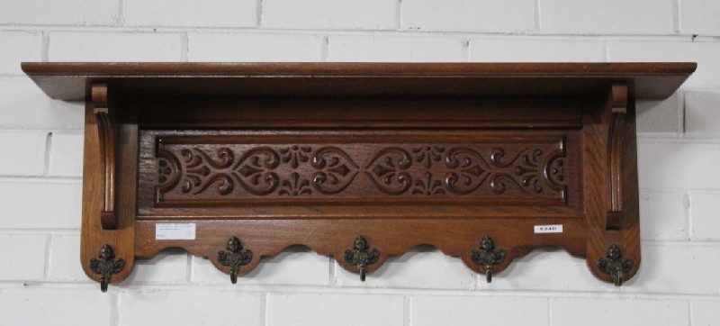 French carved oak coat rack with bronze hooks. Price !95