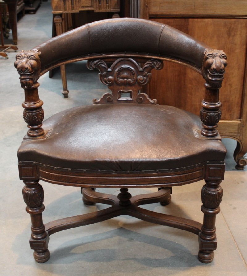 19th century French carved oak & upholstered lion decorated tub chair. Price $550