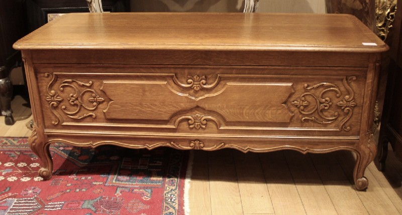 French provincial oak & floral carved coffer trunk. Price $875