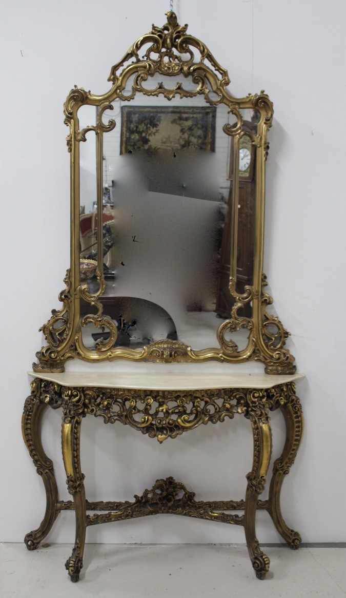 Superb Italian early 20th century gilt wood and marble top console table having matching floral decorated mirror. Price $2200
