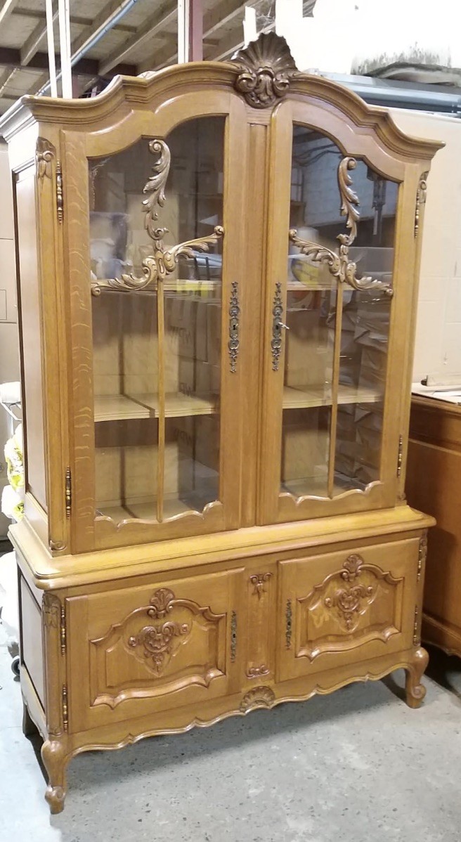 French provincial carved oak two door display vitrine. Price $950