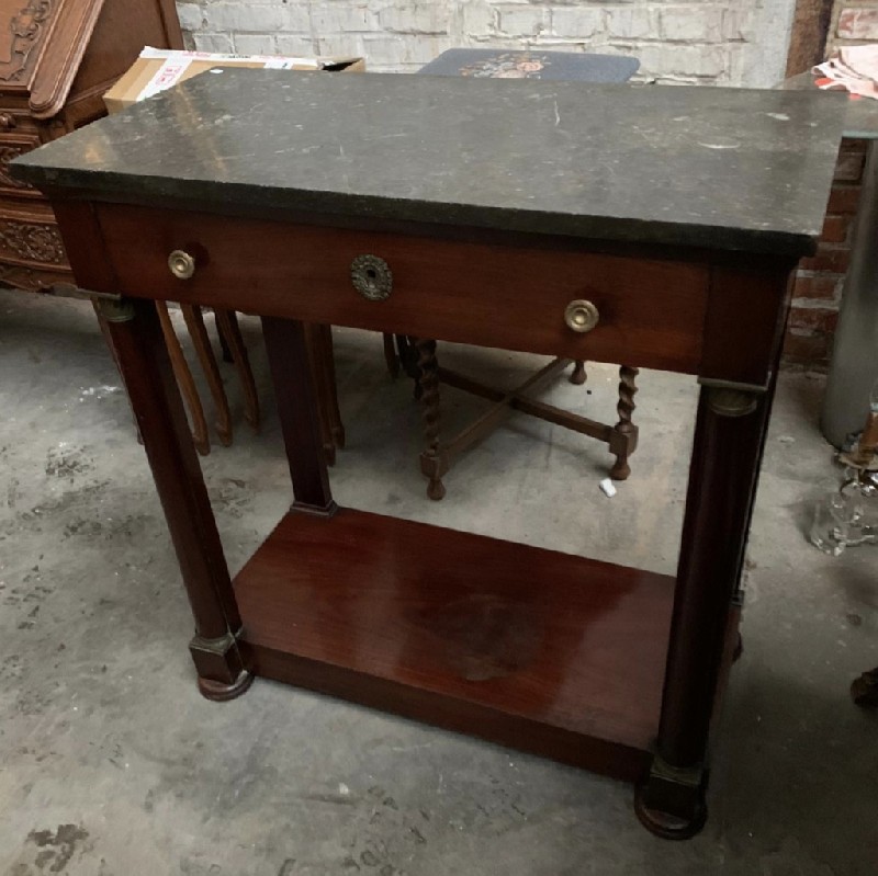 French empire 19th century mahogany and ormolu mounted console table with black marble top. Price $1100