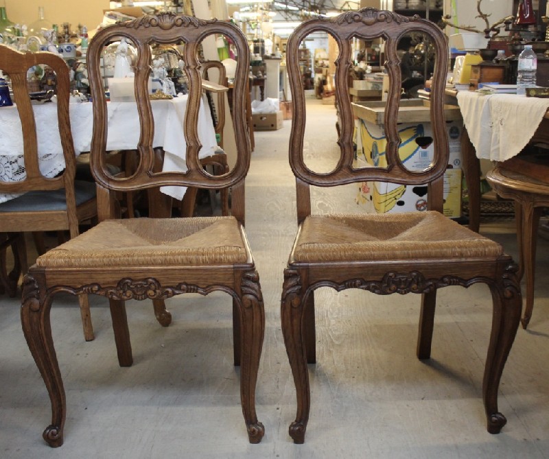 Set of six French oak and rush seated dining chairs. Price $925 set